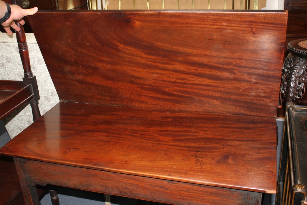 A George III mahogany folding top tea table, with chamfered legs, W.95cm D.45cm H.74cm